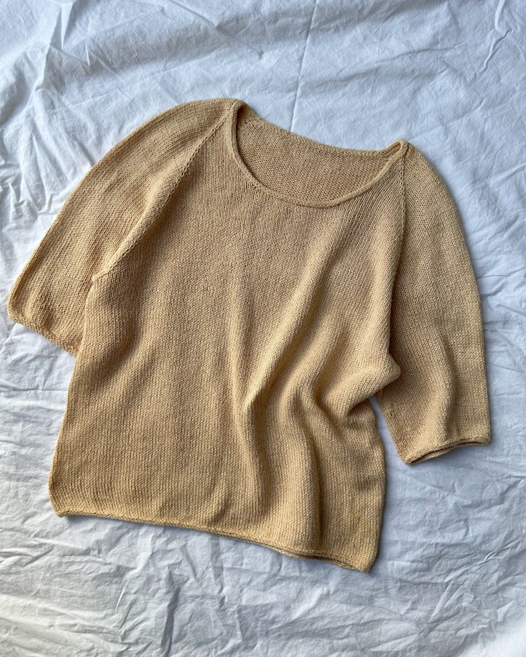 Closeup af ferskenfarvet Kumulus Tee O-neck