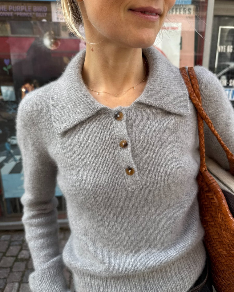 Galalit knapper med 2 huller Ø 15 mm liggende i vindueskarm