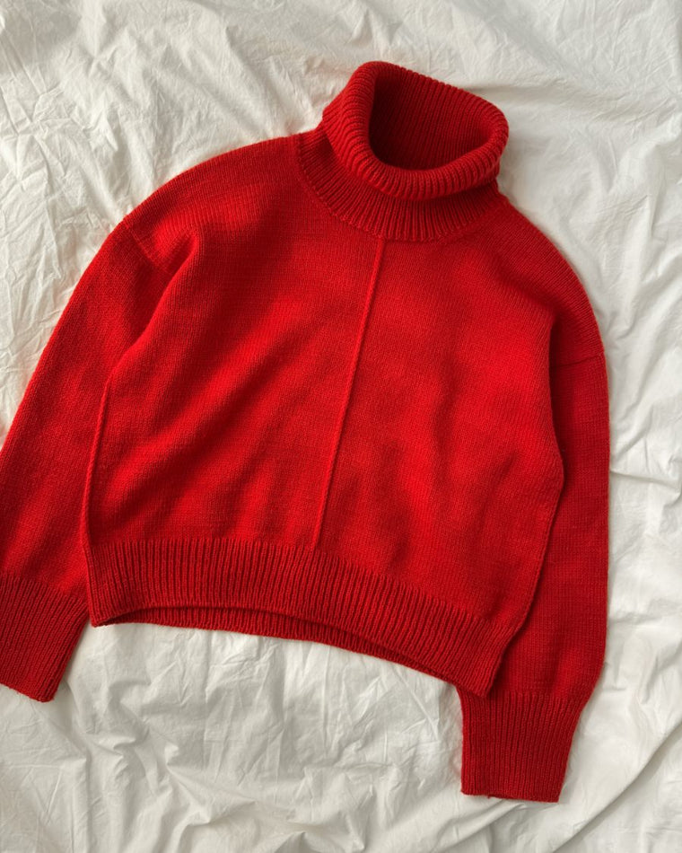 Detaljebillede af rød Scarlet Sweater