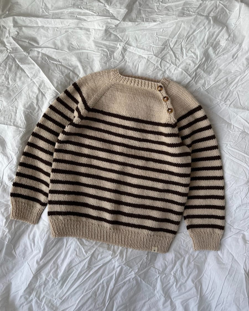 Liggebillede af sort og hvid Seaside Sweater