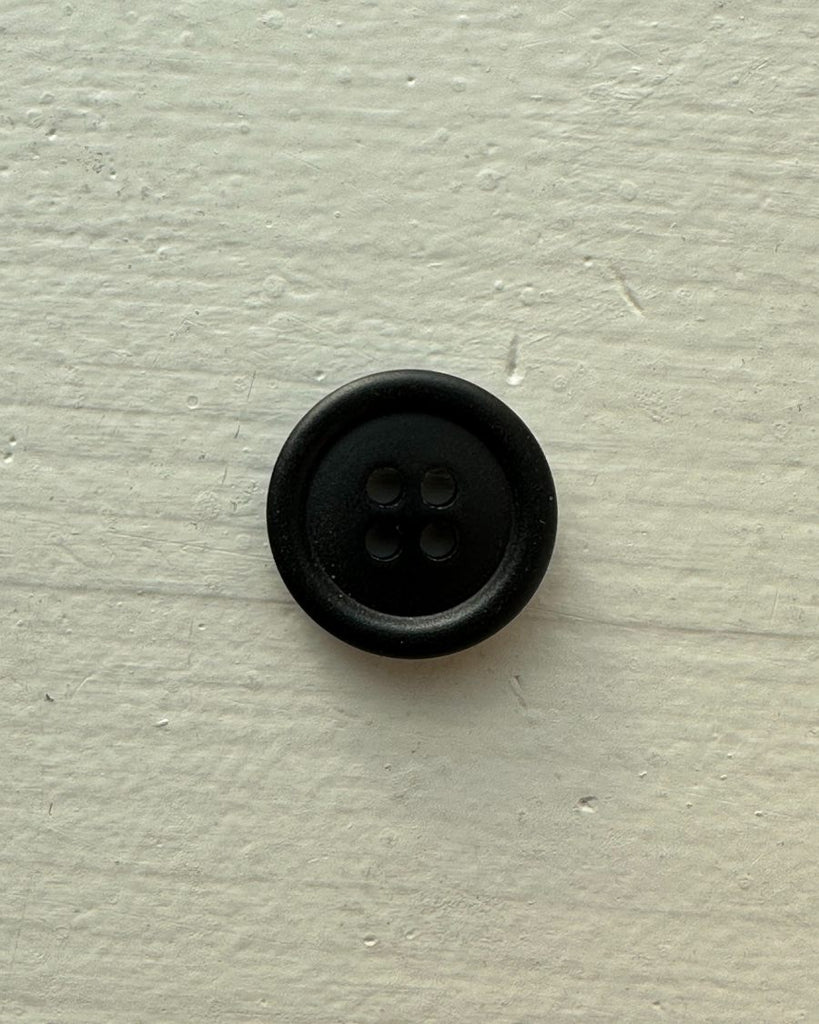 Énkelt sort galalit knap Ø 18 mm