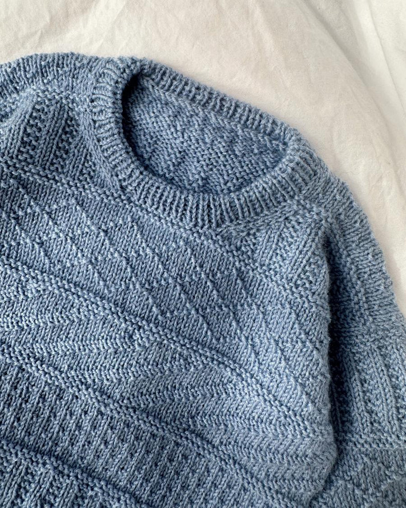 Detaljebillede af lyseblå Storm Sweater Baby 